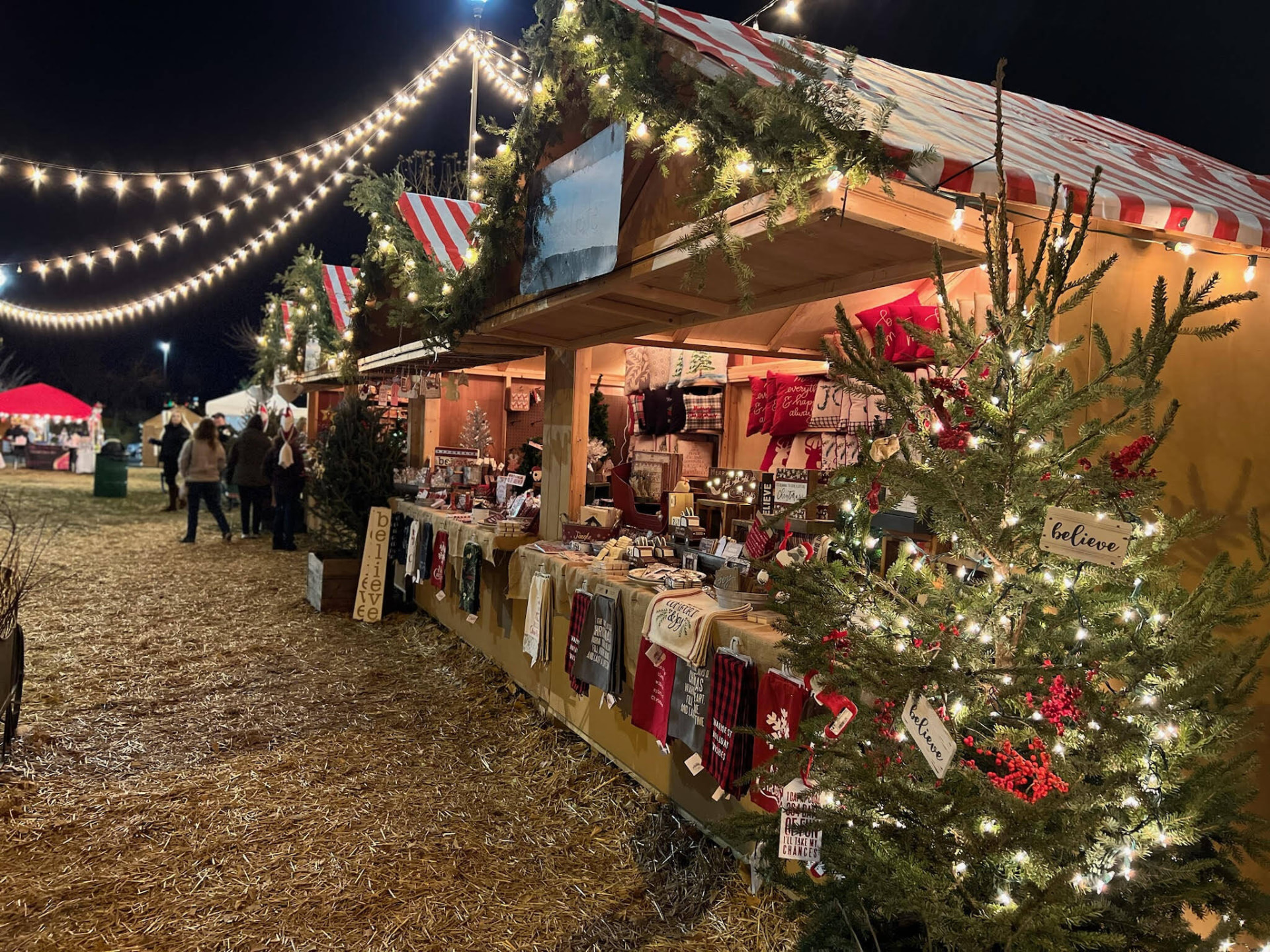 String lights over the Christmas market huts at Ottawa Chris Kringle Market